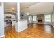 Open living space with vaulted ceilings connects kitchen, living, and dining areas at 108 Dove, Peachtree City, GA 30269