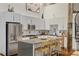 Modern kitchen with stainless steel appliances, sleek cabinetry, and a functional island with seating at 170 Boulevard Se # 115E, Atlanta, GA 30312