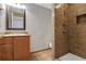 Bathroom featuring granite countertops and a walk-in shower with granite surround at 3655 Habersham Ne Rd # B-254, Atlanta, GA 30305