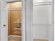 The well-organized closet offers ample storage space with shelving units and hanging racks at 3655 Habersham Ne Rd # B-254, Atlanta, GA 30305