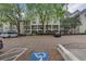 View of a lovely multi-story building with parking and greenery in a well-maintained neighborhood setting at 3655 Habersham Ne Rd # B-254, Atlanta, GA 30305
