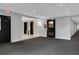 Hallway featuring well lit exit and elevator access, ensuring easy navigation at 3655 Habersham Ne Rd # B-254, Atlanta, GA 30305