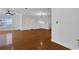 Spacious living room with hardwood floors, two closets, and large window at 3655 Habersham Ne Rd # B-254, Atlanta, GA 30305