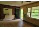 Empty room with hardwood floors and an open doorway at 4758 Highway 81, Mcdonough, GA 30252