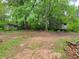 Exterior of the property shows a shed, trailer and natural surroundings at 4758 Highway 81, Mcdonough, GA 30252