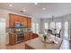 Bright kitchen features granite countertops, stainless steel appliances, and breakfast area at 4766 Cedar Wood Sw Dr, Lilburn, GA 30047