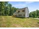 Exterior of home surrounded by a lush green lawn at 492 Mary Hill Ln, Douglasville, GA 30134