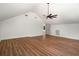 Spacious bonus room featuring hardwood floors, a ceiling fan, and bright, neutral walls at 492 Mary Hill Ln, Douglasville, GA 30134