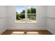 Empty closet with windows showcasing the landscape outside at 492 Mary Hill Ln, Douglasville, GA 30134