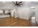 Open concept area with wood floors, kitchen and a view of the front door at 492 Mary Hill Ln, Douglasville, GA 30134