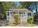 Charming single-story home with a covered front porch and well-maintained landscaping at 6149 Josephine Rd, Atlanta, GA 30340
