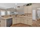 Clean kitchen with stainless steel appliances and breakfast bar at 706 Woodland Pl, Woodstock, GA 30188