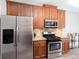 Modern kitchen featuring stainless steel appliances and granite countertops at 1546 Silvaner Nw Ave # 20, Kennesaw, GA 30152