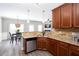 Modern kitchen features granite countertops, stainless steel appliances, and stylish cabinets at 1546 Silvaner Nw Ave # 20, Kennesaw, GA 30152