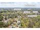 Lawrenceville, GA aerial view showcasing the home, nearby amenities, and surrounding greenery at 300 Radner Run, Lawrenceville, GA 30043