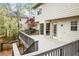 Back deck is ideal for entertaining and relaxing, with access to yard and home at 300 Radner Run, Lawrenceville, GA 30043