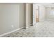 This basement space offers potential with its large open area and neutral color scheme at 300 Radner Run, Lawrenceville, GA 30043