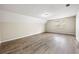 Empty bonus room with hardwood floors at 300 Radner Run, Lawrenceville, GA 30043