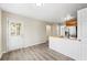 A partially renovated kitchen with stainless steel appliances, butcher block countertops, and white door at 300 Radner Run, Lawrenceville, GA 30043