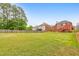 Expansive backyard with a wooden fence and plenty of green space at 3311 Keenland Rd, Marietta, GA 30062