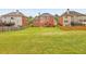 Expansive backyard featuring a lush lawn and a wooden deck, perfect for outdoor entertaining at 3311 Keenland Rd, Marietta, GA 30062
