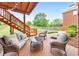 Backyard brick patio featuring outdoor seating and string lights for evening enjoyment at 3311 Keenland Rd, Marietta, GA 30062