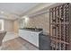 Basement bar area with wine storage and a beverage refrigerator at 3311 Keenland Rd, Marietta, GA 30062
