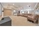 Finished basement with plush seating area, home theatre, and wet bar at 3311 Keenland Rd, Marietta, GA 30062