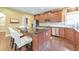Stylish kitchen with stainless steel appliances, dark wood cabinets, and a large island at 3311 Keenland Rd, Marietta, GA 30062