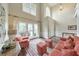 Inviting living area with large windows, hardwood floors, and comfortable seating at 3311 Keenland Rd, Marietta, GA 30062