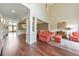 Spacious open-concept living area with hardwood floors and an abundance of natural light at 3311 Keenland Rd, Marietta, GA 30062
