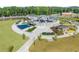 Aerial view of an outdoor amphitheater with unique architecture, complemented by lush green spaces at 3932 Boston Common St, Suwanee, GA 30024