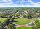 Aerial view of a park, fountain, and City Hall in a vibrant community at 3932 Boston Common St, Suwanee, GA 30024
