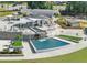 A captivating aerial view of the park, showcasing its unique layout with tables and pool waterfall feature at 3932 Boston Common St, Suwanee, GA 30024