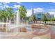 City Hall surrounded by an ornate fountain with manicured grounds and a beautiful clock tower at 3932 Boston Common St, Suwanee, GA 30024