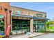 Charming retail space with inviting outdoor seating, perfect for a wine shop experience at 3932 Boston Common St, Suwanee, GA 30024