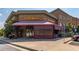 Inviting restaurant exterior featuring a covered outdoor dining area and unique architectural details at 3932 Boston Common St, Suwanee, GA 30024