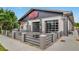 Inviting outdoor patio with fire pit and large garage doors at StillFire Brewing at 3932 Boston Common St, Suwanee, GA 30024