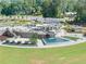 A scenic recreational park offering covered picnic areas, water features, and lush greenery for outdoor enjoyment at 3932 Boston Common St, Suwanee, GA 30024