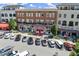 Street view of local businesses with on street parking and beautiful storefronts at 3932 Boston Common St, Suwanee, GA 30024