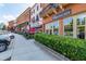 Street view of shops and restaurants, including Pulse Nail Bar, with ample parking at 3932 Boston Common St, Suwanee, GA 30024