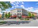 Corner street view with restaurants and shops, showcasing outdoor patios and charm at 3932 Boston Common St, Suwanee, GA 30024