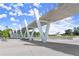 View of park's modern walking bridge featuring unique design elements and spacious recreational park areas at 3932 Boston Common St, Suwanee, GA 30024