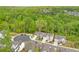 Panoramic aerial view of a neighborhood nestled among lush green trees at 412 Nickajack Retreat Ln, Smyrna, GA 30082
