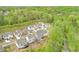 Overhead drone shot of homes in a community near a greenbelt or wooded area at 412 Nickajack Retreat Ln, Smyrna, GA 30082