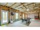 Large unfinished basement framed for a recreation room with walkout to backyard at 412 Nickajack Retreat Ln, Smyrna, GA 30082