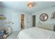 Comfortable bedroom with a dresser, neutral color scheme, and easy access to the bathroom at 412 Nickajack Retreat Ln, Smyrna, GA 30082