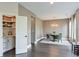 Elegant dining room with wainscoting detail, modern lighting, and access to a pantry at 412 Nickajack Retreat Ln, Smyrna, GA 30082