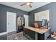 Inviting home office with black walls, stylish decor, and functional desk space perfect for working from home at 412 Nickajack Retreat Ln, Smyrna, GA 30082