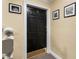 Entryway with a stylish black door, number 9, and decorative artwork at 880 Glendale Ne Ter # 9, Atlanta, GA 30308